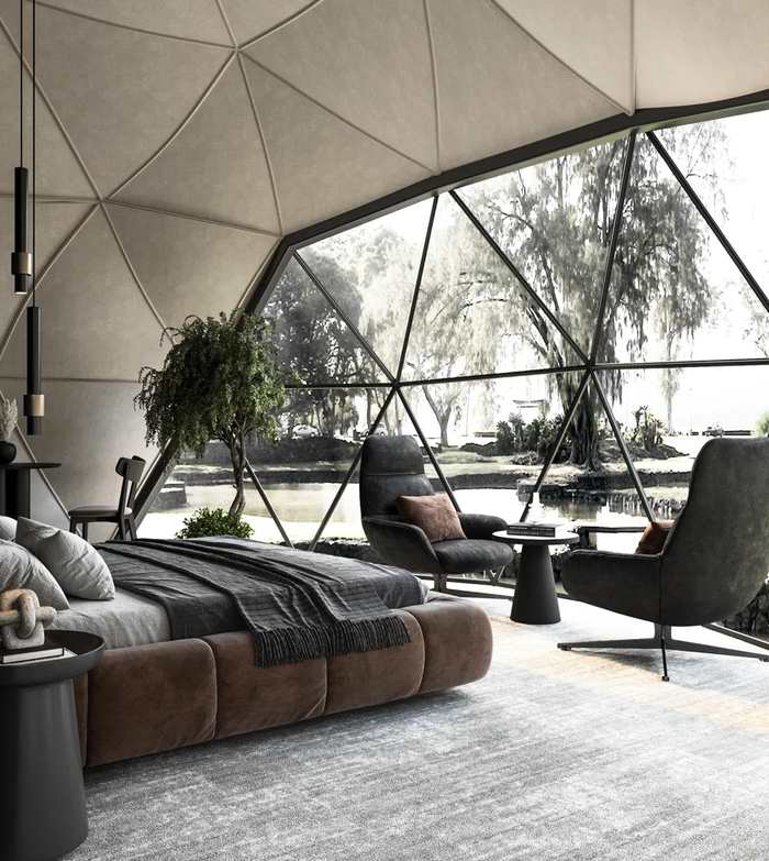 Dome living interior with lounge seating and panoramic triangular glazing